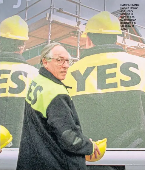  ??  ?? CAMPAIGNIN­G: Donald Dewar and Henry Mcleish in front of Yes to devolution billboards in Glasgow in 1997.