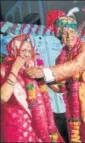  ?? HT ?? Chetan Gehlot, 86, and Kamla Devi, 82 , at their second wedding ceremony in Bikaner.