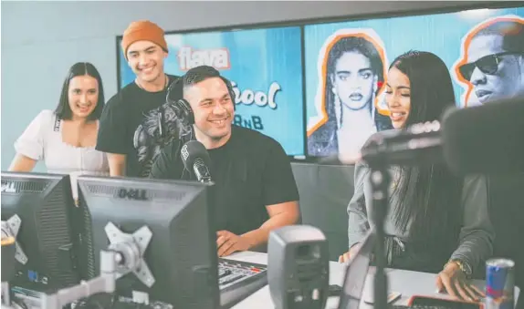  ?? Photo / NZ Herald ?? Joseph Parker got some practice in the studio with co-host Athena Angelou ahead of his stint on Flava Breakfast.