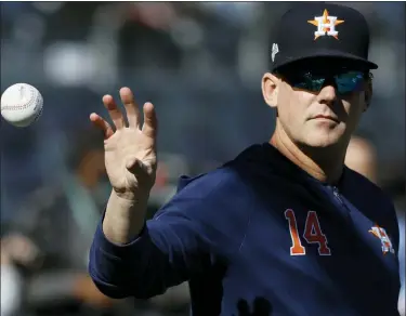  ?? ASSOCIATED PRESS FILE PHOTO ?? The Detroit Tigers have hired A.J. Hinch as their new manager, giving him a chance to return to a major league dugout after he was fired by Houston in the wake of a sign-stealing scandal. He led Houston to a World Series title in 2017.