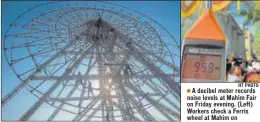  ??  ?? A decibel meter records noise levels at Mahim Fair on Friday evening. (Left) Workers check a Ferris wheel at Mahim on Thursday.