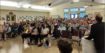  ?? PENTICTON AND WINE COUNTRY CHAMBER OF COMMERCE/Special to The Herald ?? Nearly 300 people turned out Tuesday night at the Penticton Seniors’ Drop-In Centre to hear from the 16 people running for city council and five people running for mayor.