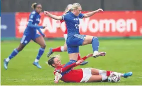  ??  ?? BLUES AND TWOS: Left, Remi Allen heads in City’s second goal, above, Charlie Devlin is tackled by Charlton’s Ella Rutherford and, below, City captain Sophie Barker clashes with Charlton keeper Eartha Cumings