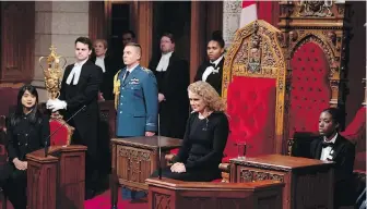  ??  ?? Gov. Gen. Julie Payette participat­es in a royal assent ceremony in the Senate Chamber on Parliament Hill. A new law would spell out powers and privileges of MPs and senators.