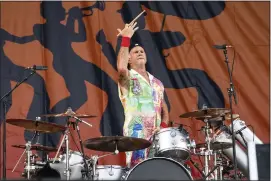  ?? PHOTO BY AMY HARRIS — INVISION ?? Chad Smith of the Red Hot Chili Peppers performs at the New Orleans Jazz and Heritage Festival, on May 1 in New Orleans.