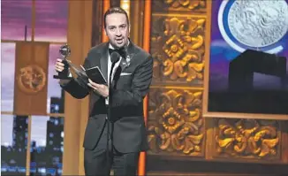  ?? Theo Wargo Getty Images ?? TONY AWARD triumph. Miranda accepts the prize for musical book, one of 11 that the show wins.