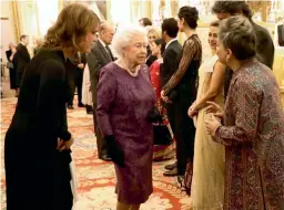  ??  ?? Queen Elizabeth II attends a reception to mark the launch of the UK-India Year of Culture 2017 at the Buckingham Palace in London on Monday. (Right) Indian sitar player Anoushka Shankar during the event.