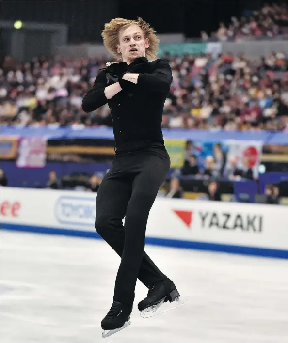  ?? — GETTY IMAGES ?? Sergei Voronov of Russia performs during the men’s singles free skating event in the NHK Trophy figure skating competitio­n in Osaka on Saturday. He edged out second-place Adam Rippon of the U.S. and third-place Alexei Bychenko of Israel to claim top...