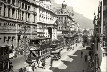  ??  ?? Trams running along Adderley Street