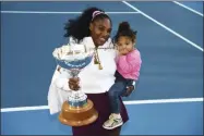  ?? CHRIS SYMES - THE ASSOCIATED PRESS ?? Serena Williams from the United States with daughter Alexis Olympia Ohanian Jr. and the ASB trophy after winning her singles finals match against United States Jessica Pegula at the ASB Classic in Auckland, New Zealand, Sunday, Jan 12, 2020.