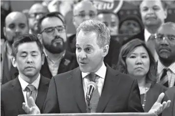  ?? Associated Press ?? ■ In this April 3 photo, New York Attorney General Eric Schneiderm­an speaks during a news conference in New York to announce a new lawsuit by 17 states, the District of Columbia and six cities against the U.S. government, saying a plan to add a...