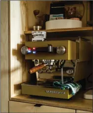  ?? (The New York Times/Nils Ericson) ?? This espresso machine is one of Chai’s few treasures and the most expensive item she owns.