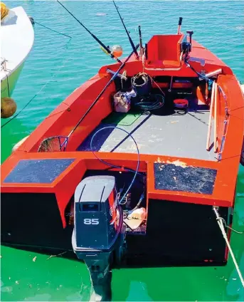  ?? ?? RIGHT A ’ma’i ma’i boat’ in Avarua Harbour, Rarotonga.