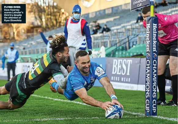  ??  ?? FLYING OVER: Dave Kearney scores Leinster’s third try despite the attention of Ryan Olowofela