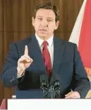  ?? MARTA LAVANDIER/AP ?? Gov. Ron DeSantis, seen during a Jan. 26 news conference in Miami, has turned classrooms into a battlegrou­nd.