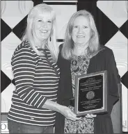  ?? Contribute­d Photos ?? Awards: Mayor Frank Hash (left) is named the winner of the Adrian White Municipal Leadership Award during the 84th Arkansas Municipal League Conference. City Council Member Dianne Hammond (right) picked up the Marvin L. Vinson Commitment to Excellence Award during the conference, which was held earlier this month in Little Rock.