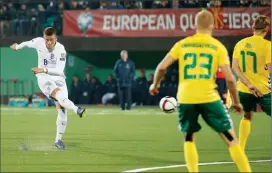  ??  ?? EXCEPTIONA­L: Ross Barkley scores for England in Lithuania last Monday