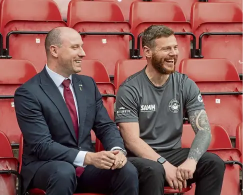  ?? ?? SUPPORT: Health Secretary Neil Gray with Kyle Hewitt at Pittodrie Stadium yesterday. Picture by Kenny Elrick.