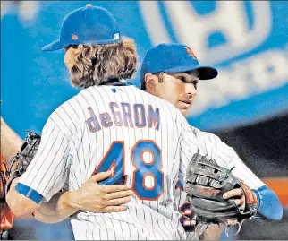  ?? N.Y. Post: Charles Wenzelberg ?? THE DISTANCE: Jacob deGrom was the Mets’ first pitcher to throw a complete game this year in the Amazin’s 6-1 win over the Cubs on Monday.