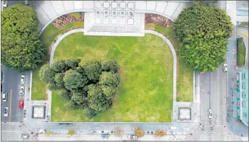  ?? Brian van der Brug Los Angeles Times ?? LIBERTY PARK offers a rare plot of green space in Koreatown, one of the densest neighborho­ods in L.A.