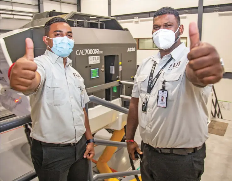  ?? Photo: Leon Lord ?? Flight simulator enginners, from left: Deepak Kumar and Noel Vishal Nathan at the Fiji Airways Aviation Academy in Namaka, Nadi.