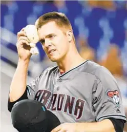  ?? GETTY ?? Zack Greinke is traded from Diamondbac­ks to Astros, giving Houston a powerhouse rotation for the playoffs.