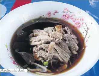  ??  ?? Noodles with duck.