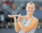  ?? REUTERS ?? Petra Kvitova celebrates with the trophy in Madrid