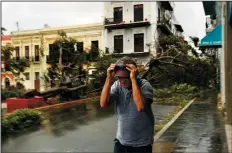  ?? CAROLYN COLE/LOS ANGELES TIMES ?? In Old San Juan, Puerto Rico, Hurricane Maria tore down many trees and did damage to the many old structures in the area, on Wednesday.