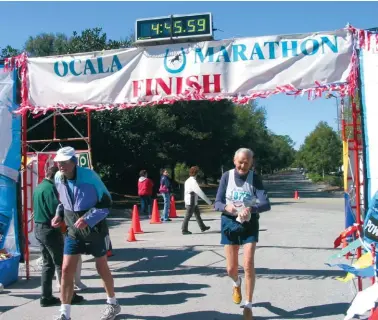  ??  ?? BELOW Herman finishes the Ocala Marathon in Ocala, Fla. on Feb. 5, 2006 in a time of 4:45:59