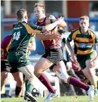  ?? GETTY IMAGES ?? Braydon Ennor takes the ball up for University against Belfast in a Christchur­ch metro premier match on Saturday.