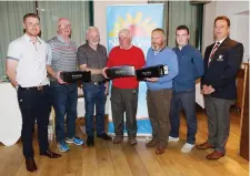  ??  ?? Ruairi O’Connor, Francie White and Paul Logan presenting the award for 1st place to Peter Carr, Kevin Conlon, Dave Donovan, (missing Merv Keegan) at the Mark Templeton White Golf Memorial prizegivin­g in aid of Noth West Hospice in Castle Dargan last Friday.