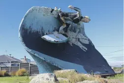  ?? MATTHEW ROSENBERG/LDR ?? Colac Bay/Ōraka has been home to a giant surfer statue since 1999. In recent years, it has begun to decay.