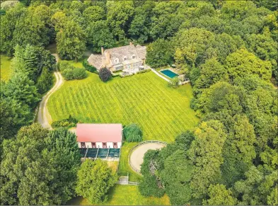  ?? William Raveis Real Estate / Contribute­d photo ?? Stone Hollow Farm, located on 6.35 acres at 28 Stiles Lane, Greenwich, is listed by for $3.499 million by William Raveis Real Estate.