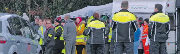  ?? ?? Gardai and volunteers gathered at Doorly Park for the search for Rodney Horan.