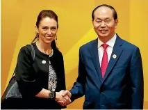  ?? PHOTO: REUTERS ?? Prime Minister Jacinda Ardern shakes hands with Vietnamese President Tran Dai Quang at an Apec leaders’ meeting in Da Nang, Vietnam.