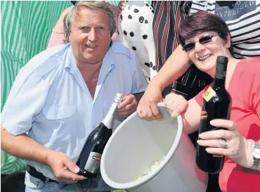  ??  ?? Fundraisin­g Rozelle owner Forbes Robertson and Anne Gibson at a previous Holyfair event at Ayr’s Low Green
