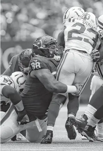  ?? Godofredo A. Vasquez / Houston Chronicle ?? The play of second-year nose tackle D.J. Reader (98) in the middle is part of the reason why the Texans’ defense is allowing only 96.3 rushing yards per game.