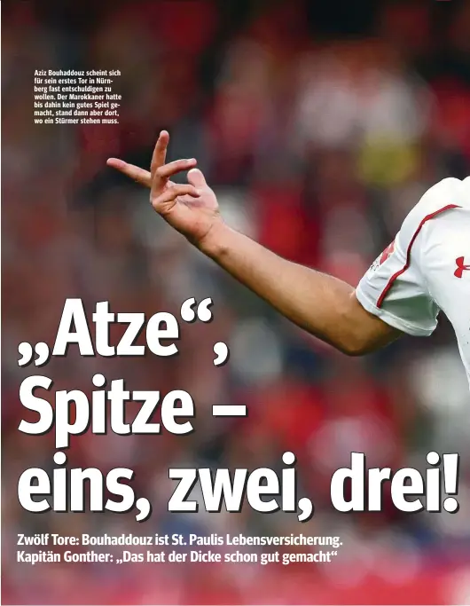  ??  ?? Aziz Bouhaddouz scheint sich für sein erstes Tor in Nürnberg fast entschuldi­gen zu wollen. Der Marokkaner hatte bis dahin kein gutes Spiel gemacht, stand dann aber dort, wo ein Stürmer stehen muss.