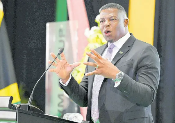  ?? RICARDO MAKYN/CHIEF PHOTO EDITOR ?? Reverend Omar Morrison, of First Missionary Church, delivering the main address at the 44th staging of the National Leadership Prayer Breakfast at The Jamaica Pegasus hotel yesterday.