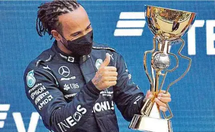  ?? ?? Lewis Hamilton ganó ayer en Rusia y alcanzó los 100 triunfos en la máxima categoría del automovili­smo. Puede romper más marcas.afp