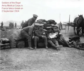  ??  ?? Soldiers of the Royal Army Medical Corps in France take a break on 2 September 1914