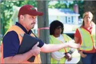  ?? Jarret Liotta / For Hearst Connecticu­t Media ?? Sean Redding, manager of vegetation management with Eversource, explains the dangers of arcing and why the utility had to do emergency tree pruning in Darien in this file photo.