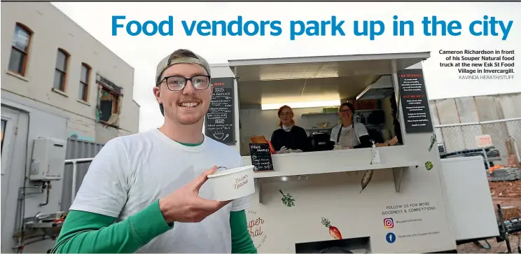  ?? KAVINDA HERATH/STUFF ?? Cameron Richardson in front of his Souper Natural food truck at the new Esk St Food Village in Invercargi­ll.