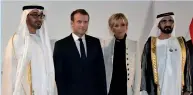  ?? AFP file ?? Sheikh mohammed bin Zayed and Sheikh mohammed bin Rashid with french President Emmanuel macron, and his wife brigitte macron at the entrance of the Louvre Abu Dhabi museum during its official inaugurati­on. —