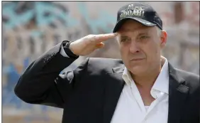  ?? (AP/Nick Ut) ?? Actor Tom Sizemore salutes in honor of Memorial Day at the Mexican-American All Wars Memorial in Los Angeles in 2011.