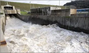  ?? KENNETH JAMES — CALIFORNIA DEPARTMENT OF WATER RESOURCES ?? Water is released down the spillway at Coyote Dam at Lake Mendocino near Ukiah on Jan. 16.