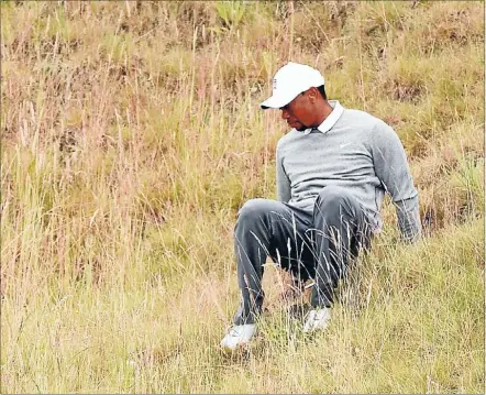  ?? Photo: GETTY IMAGES ?? Tiger Woods fell literally and figurative­ly at the the US Open.