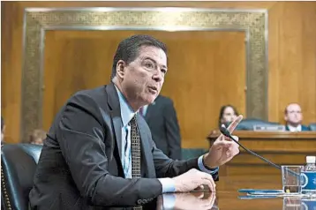  ?? SHAWN THEW/EPA ?? FBI Director James Comey told senators that the idea he affected the election makes him “mildly nauseous.”