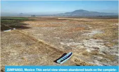  ?? ?? ZUMPANGO, Mexico: This aerial view shows abandoned boats on the completely dry Zumpango lake in San Pedro de la Laguna, Mexico. — AFP photos